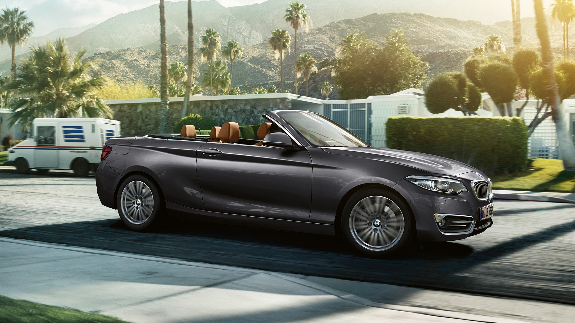 BMW 2 Series Convertible, driving shot from the side BMW 2 Series Convertible, driving shot from the side