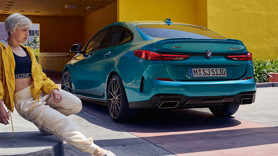 Powerful rear BMW 2 Series Gran Coupé F44 Snapper Rocks Blue metallic three-quarter side view