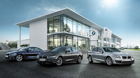 BMW Approved Used Cars in front of BMW car dealership BMW 4 Series BMW Approved Used Cars in front of BMW car dealership