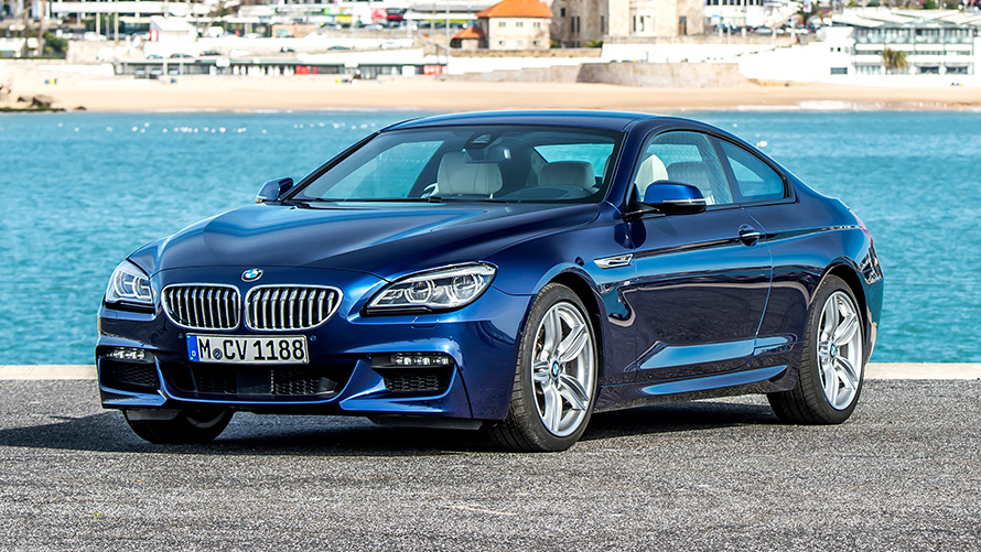 BMW 6 Series Coupé (F13) three-quarter front view in front of beach BMW 6 Series Coupé (F13) three-quarter front view in front of beach