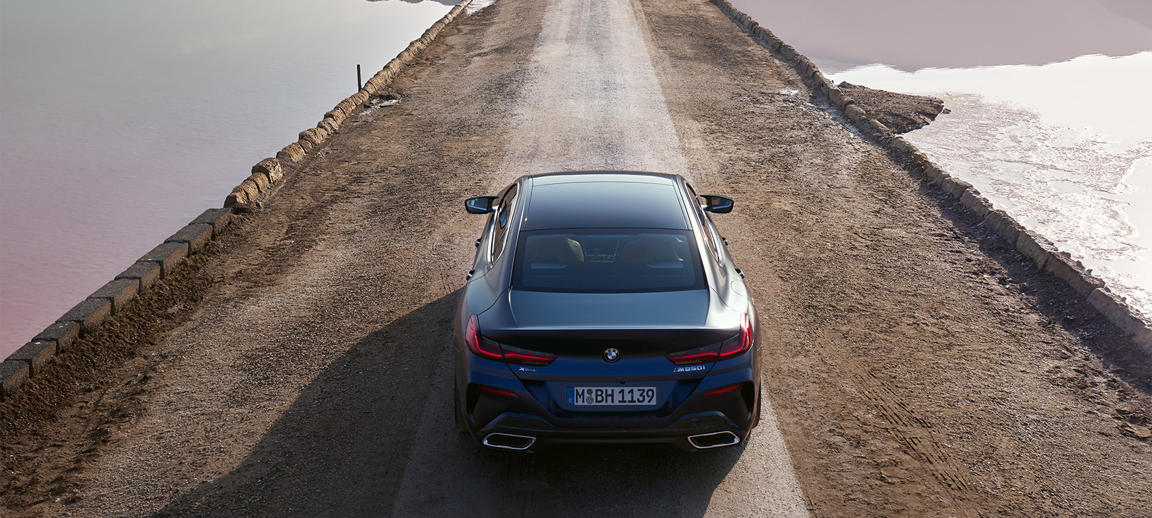 BMW M850i xDrive Gran Coupé G16 LCI Facelift 2022 BMW Individual Frozen Tanzanite Blue metallic rear from bird’s eye view BMW M850i xDrive Gran Coupé G16 LCI Facelift 2022 BMW Individual Frozen Tanzanite Blue metallic rear from bird’s eye view