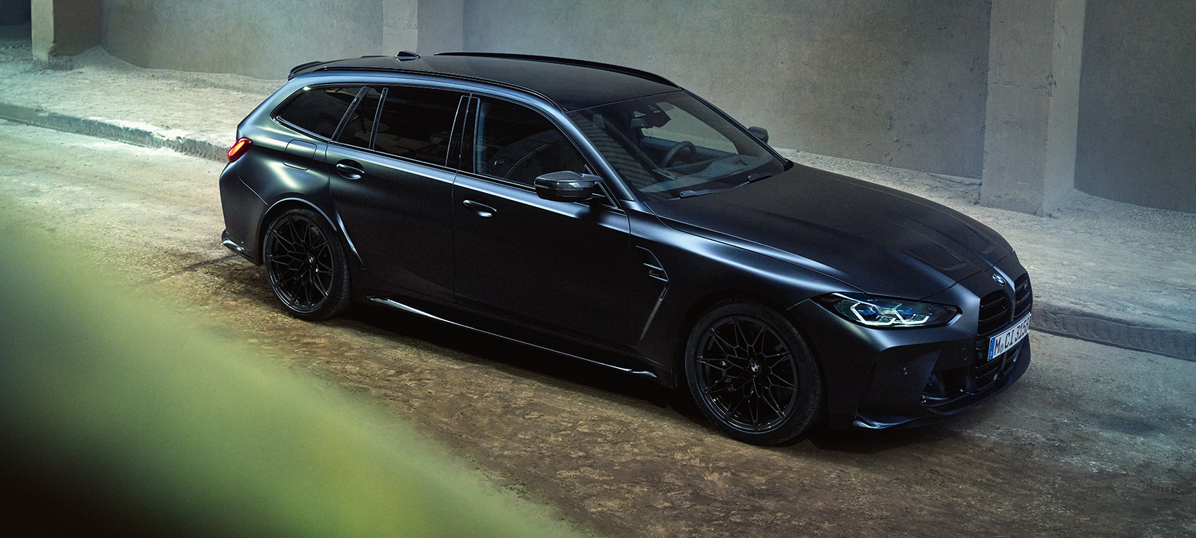 BMW M3 Competition Touring G81 side view BMW M3 Competition Touring G81 BMW Individual Frozen Black metallic side view standing