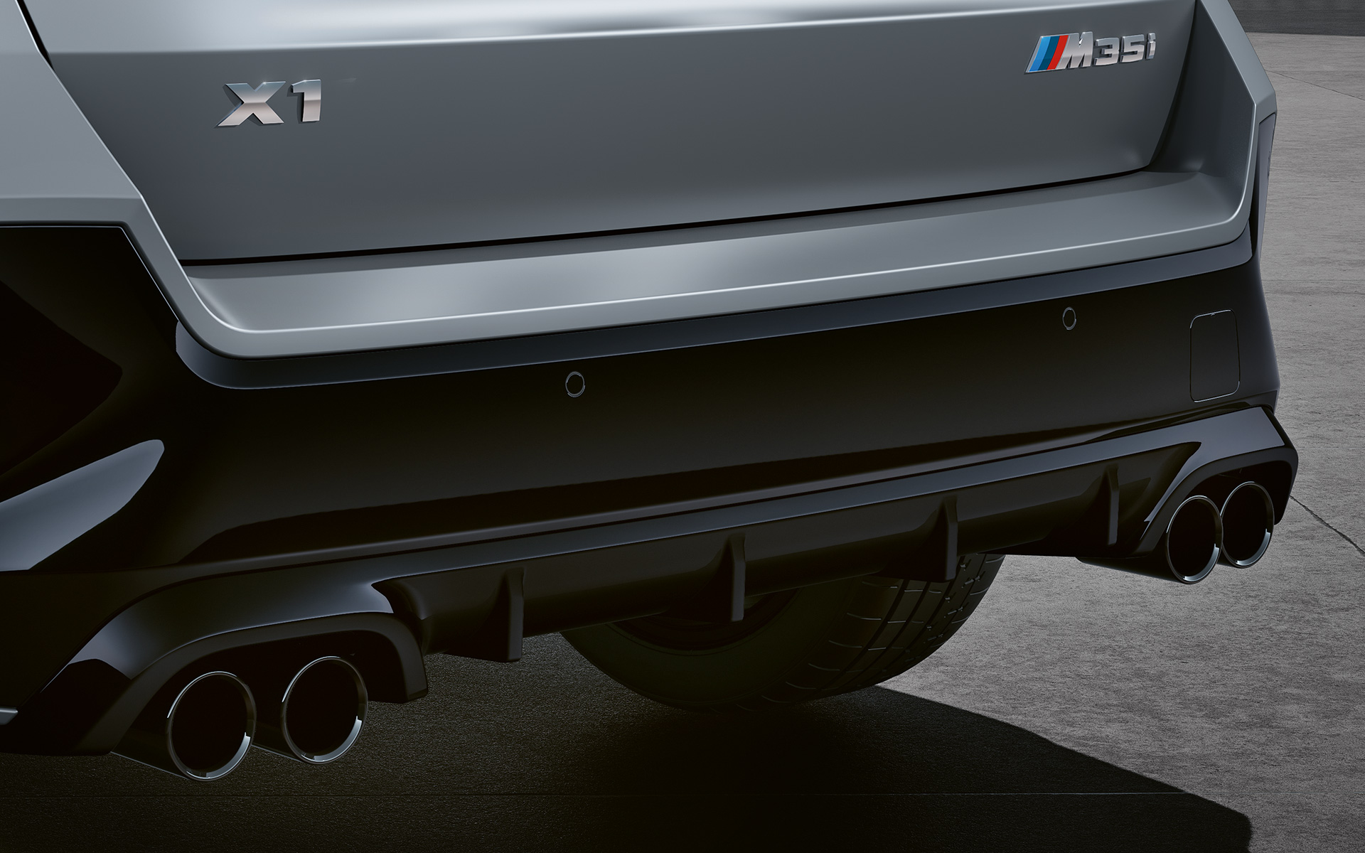 BMW X1 M35i xDrive detail tailpipes BMW X1 M35i xDrive Exterior detail tailpipes