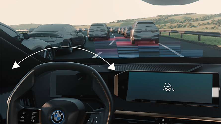View from BMW interior with steering wheel and road View from BMW interior with steering wheel and road with cars
