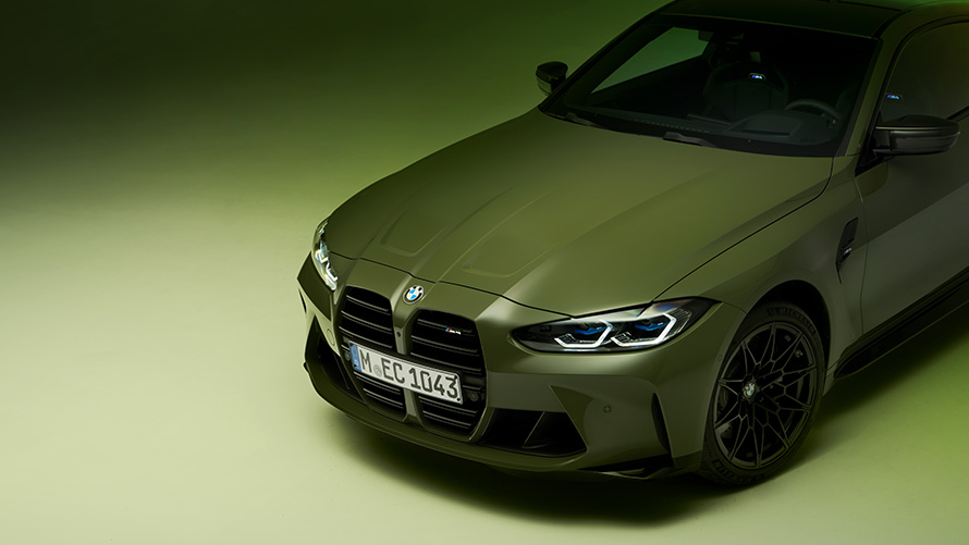 BMW M4 Competition Coupé G82 2021 BMW Individual Urban Green three-quarter front view with top view in section