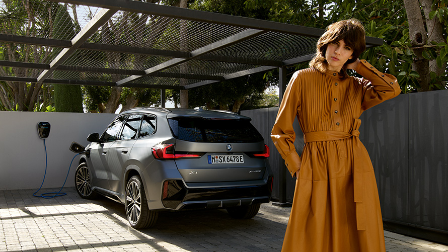 BMW X1 Plug-in Hybrid 2022 U11 Rear view charging with model BMW X1 Plug-in Hybrid 2022 U11 Rear view charging with model